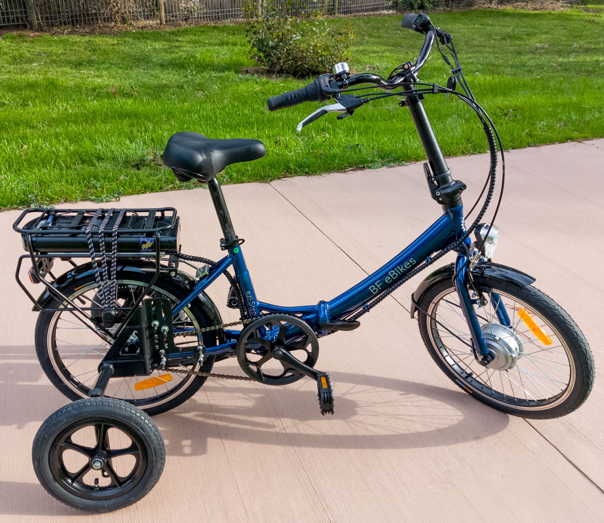 Folding E-Bike with stabilisers – Rev Bikes