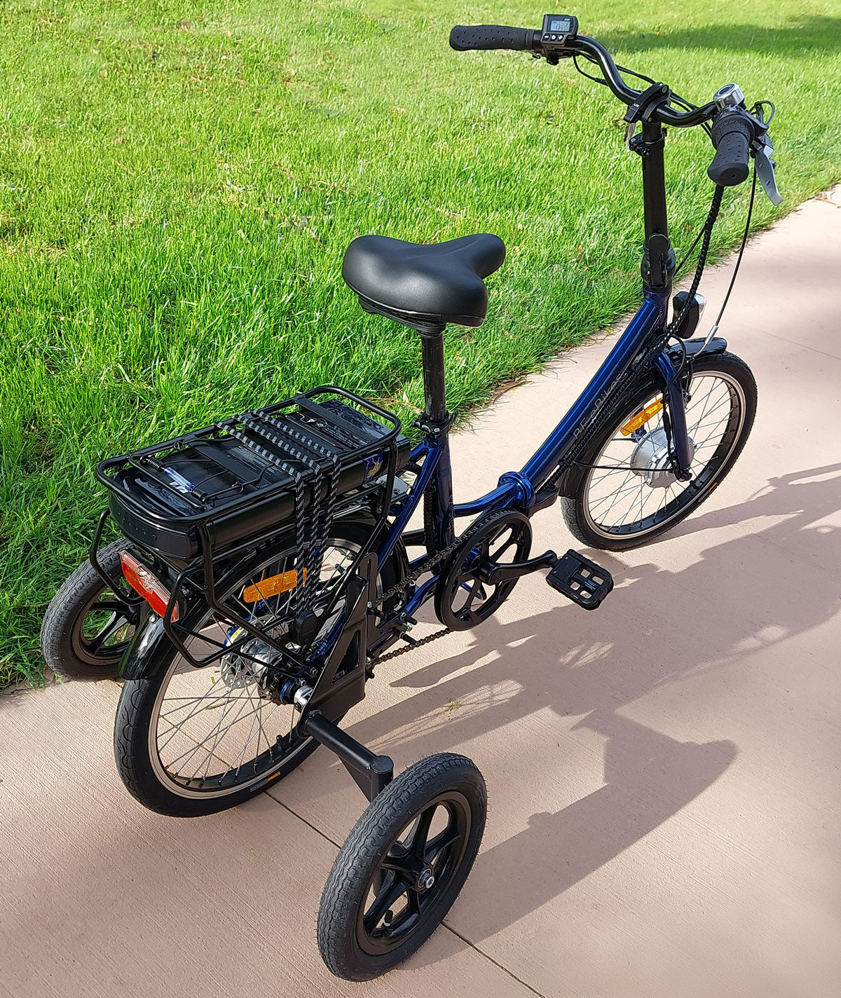 Folding E-Bike with stabilisers – Rev Bikes - Main Image